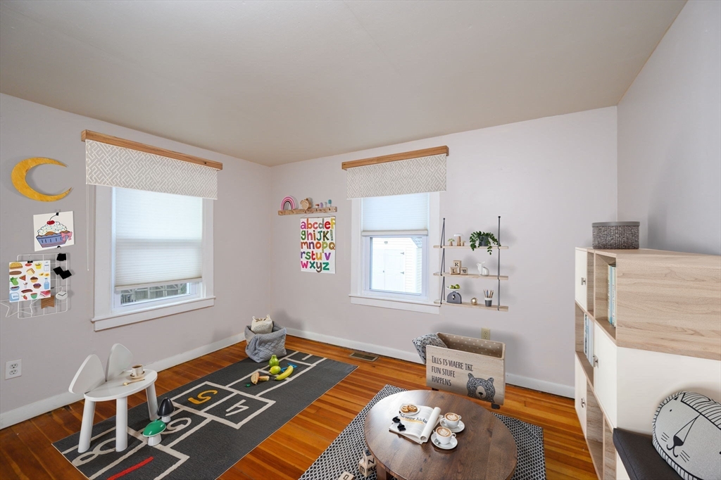 134 Hampton Circle Hull, MA 02045 - Photo 20 of 41 a bedroom with furniture and a window