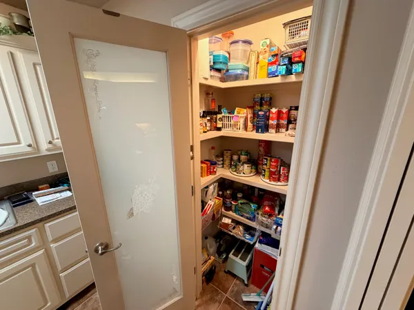 a living room with furniture window and a flat screen tv