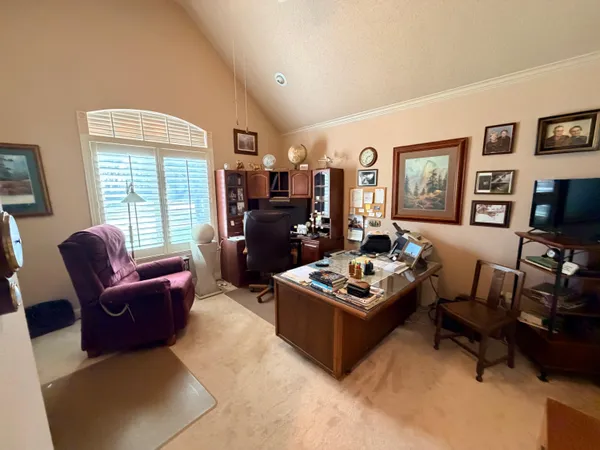 a bathroom with a double vanity sink toilet mirror and shower