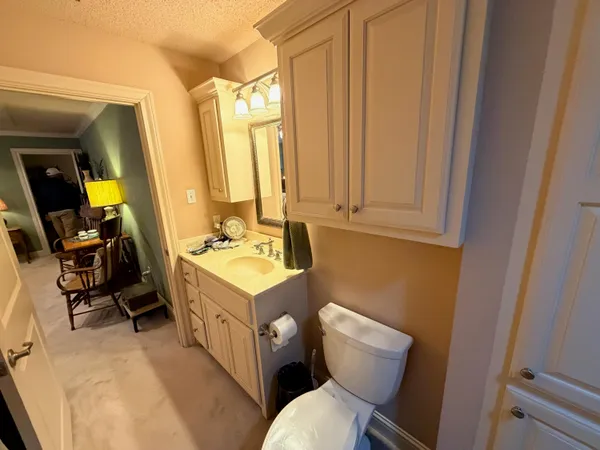 a bed room with a bed window and a chair