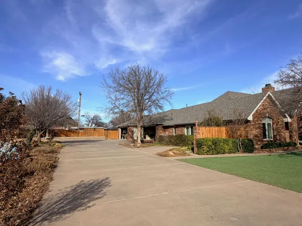a view of house with outdoor space and street view