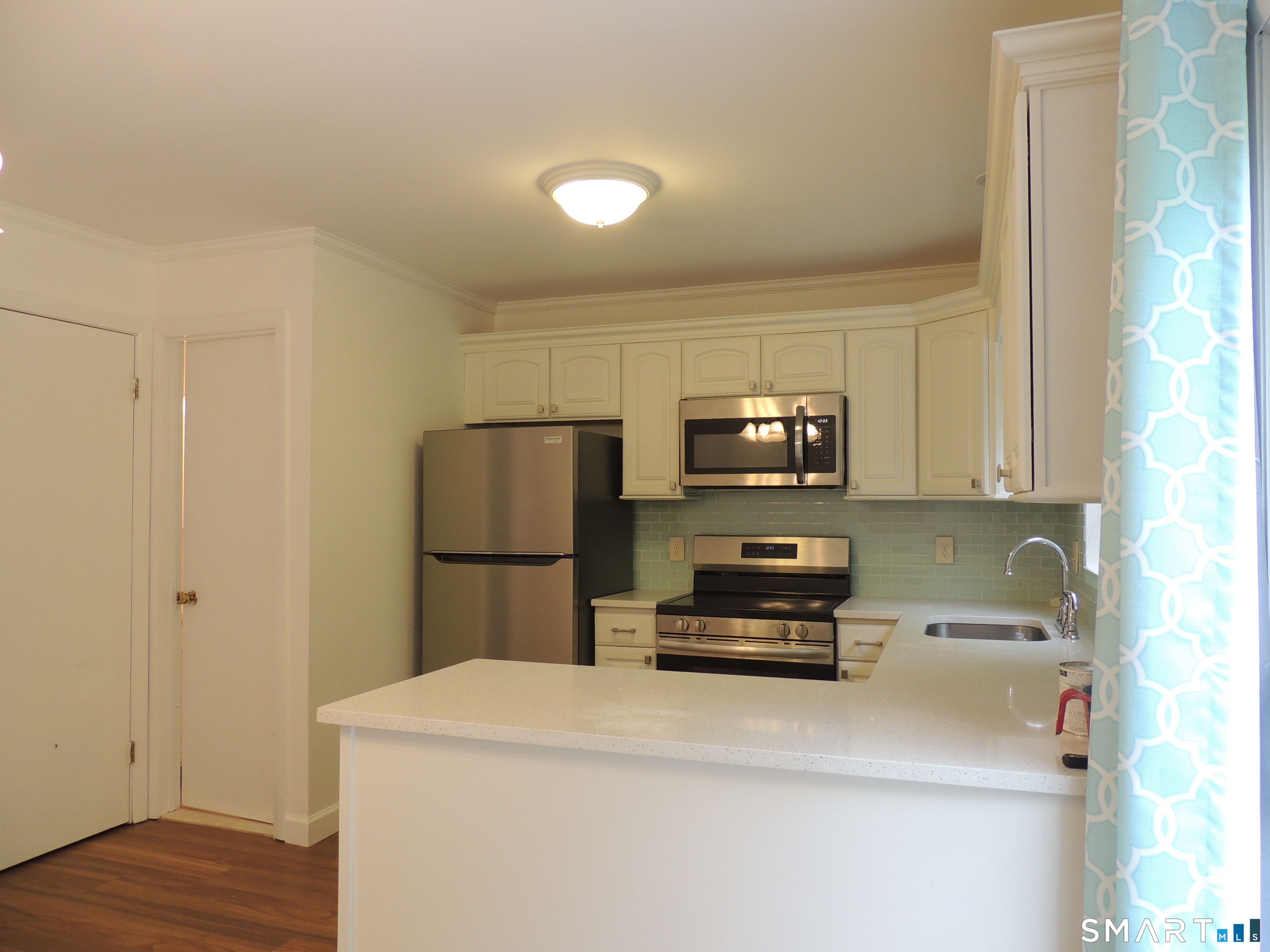 241 Branford Road, Unit 256 North Branford, CT 06471 - Photo 11 of 37 Plenty of work space/cabinets