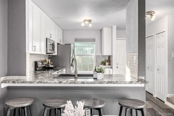 $379,999 | 10537 West Maplewood Drive, Unit C, Littleton, CO 80127