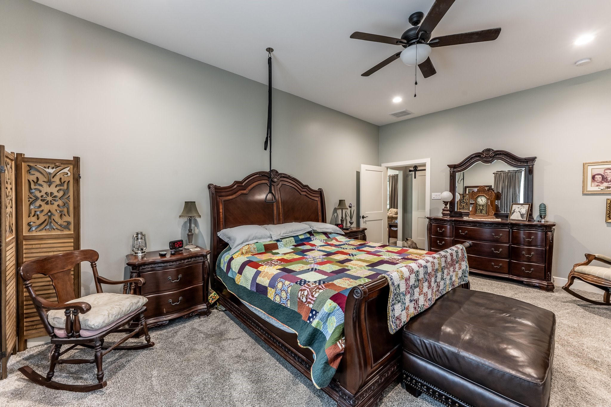 13334 Fultz Road Conroe, TX 77304 - Photo 13 of 49 A peaceful retreat designed for rest and relaxation, this spacious primary suite invites you to unwind in quiet comfort.