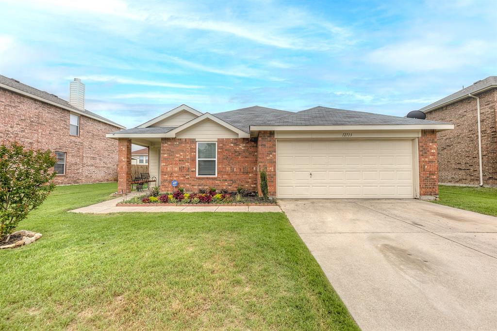 12713 Kingsgate Drive Rhome, TX 76078 - Photo 1 of 1 a front view of a house with a yard