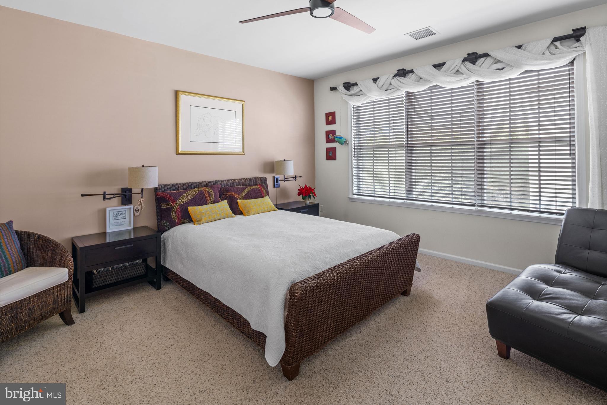 227 Timberlake Drive Ewing, NJ 08618 - Photo 12 of 21 a bedroom with a bed couch and window