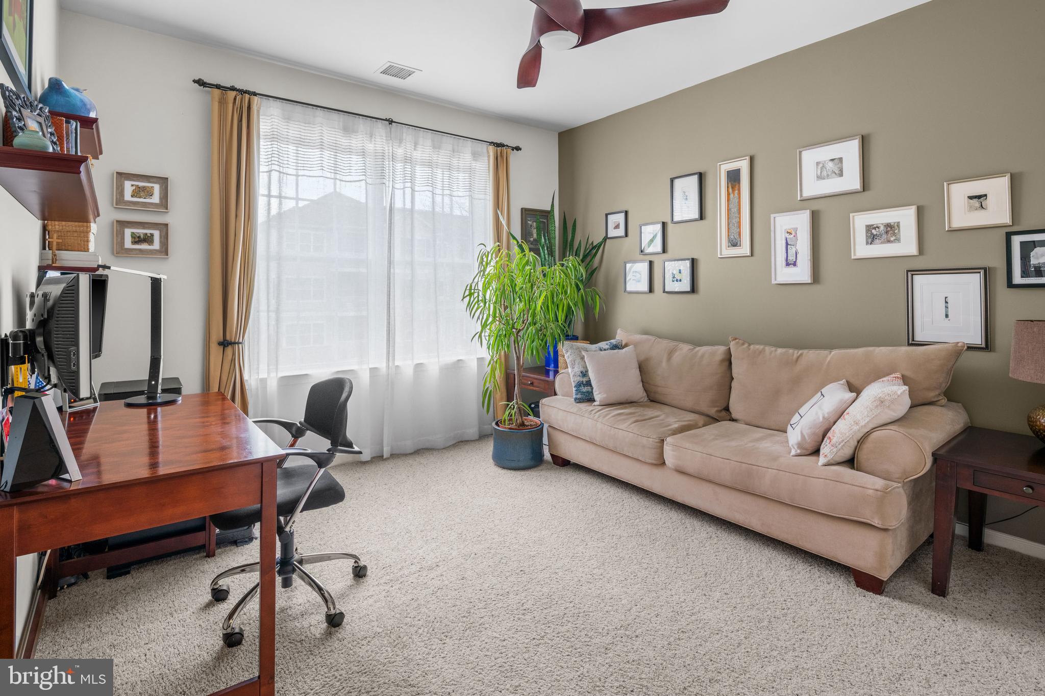 227 Timberlake Drive Ewing, NJ 08618 - Photo 16 of 21 a living room with furniture and a flat screen tv