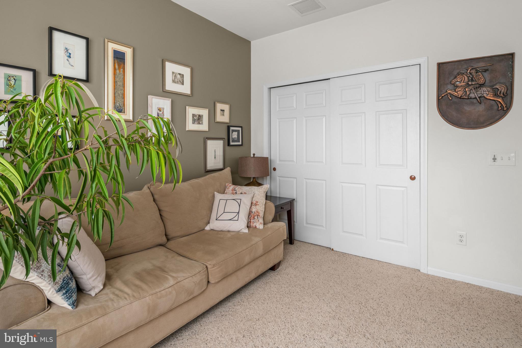 227 Timberlake Drive Ewing, NJ 08618 - Photo 18 of 21 a living room with furniture and a potted plant