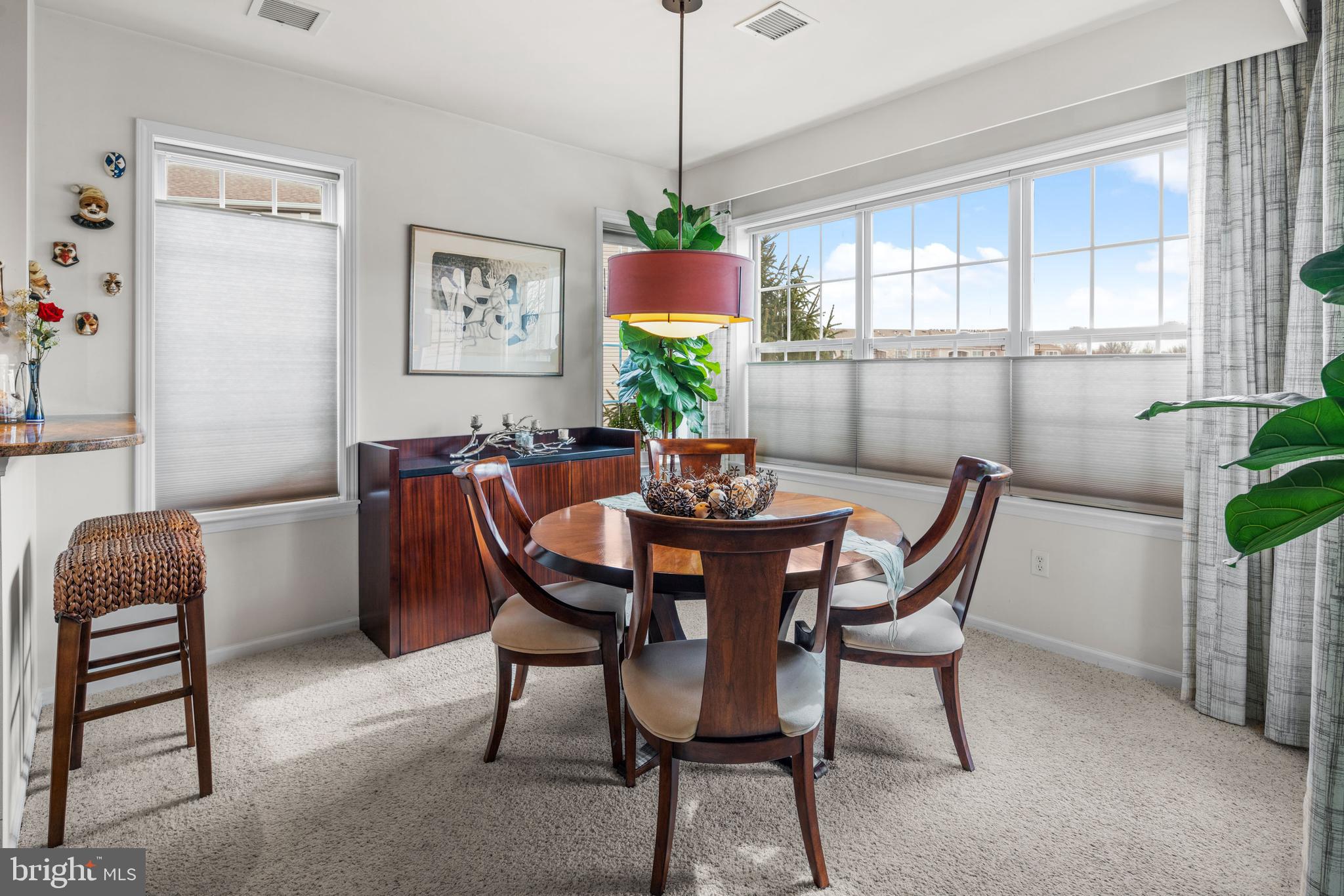 227 Timberlake Drive Ewing, NJ 08618 - Photo 6 of 21 a dining room with furniture a livingroom and a chandelier