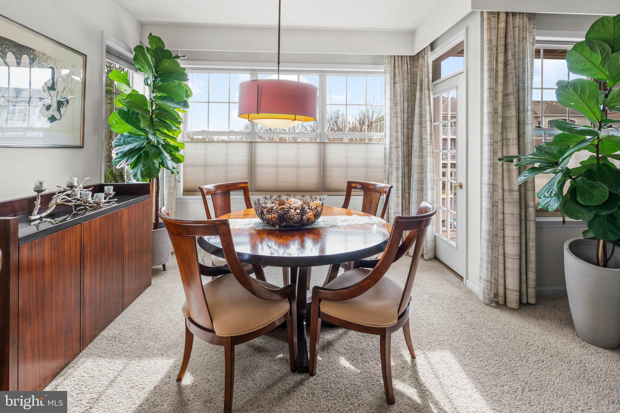 227 Timberlake Drive Ewing, NJ 08618 - Photo 7 of 21 a dining room with furniture and a potted plant