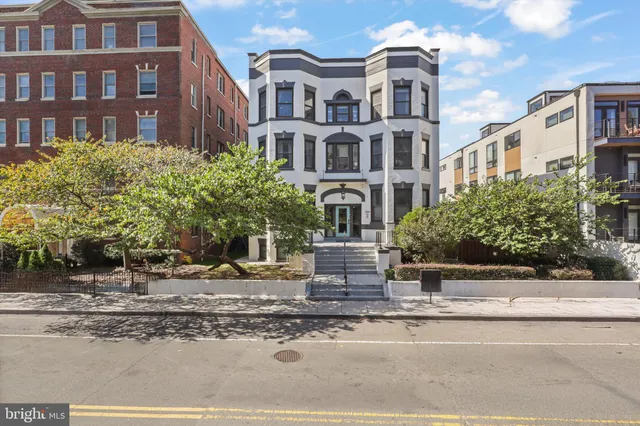 a front view of a multi story residential apartment building