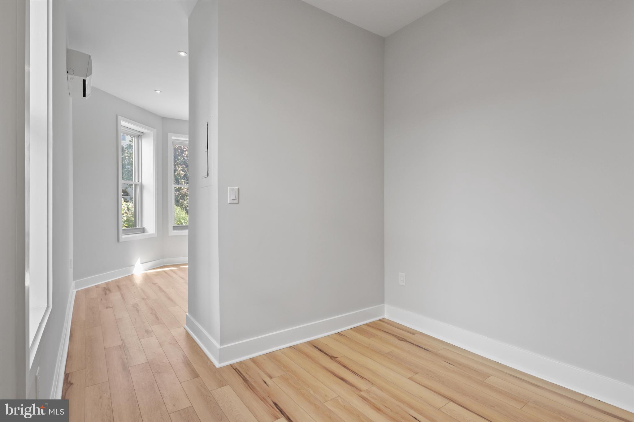 3504 13th Street Northwest, Unit 12 Washington, DC 20010 - Photo 11 of 24 a view of a hallway with wooden floor