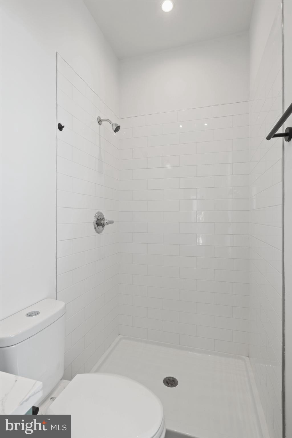 3504 13th Street Northwest, Unit 12 Washington, DC 20010 - Photo 13 of 24 a bathroom with a toilet and shower