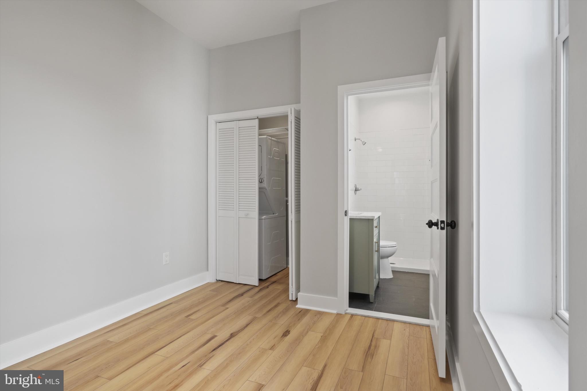 3504 13th Street Northwest, Unit 12 Washington, DC 20010 - Photo 9 of 24 a view of a bathroom from a hallway