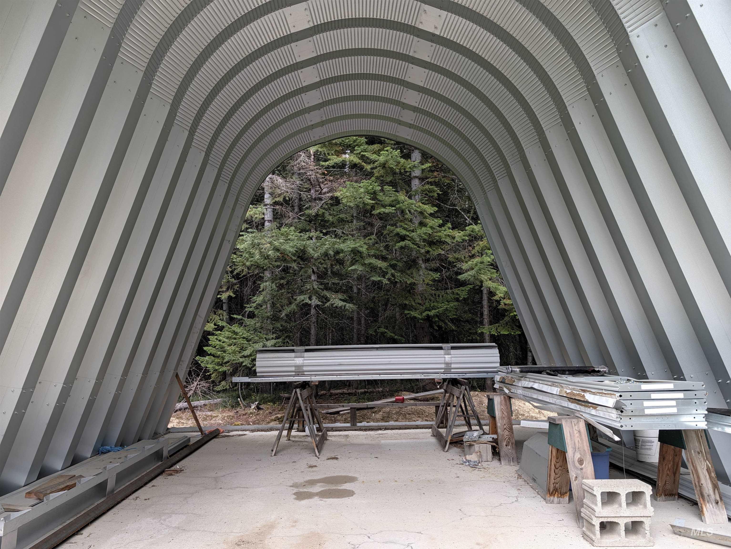 524 Rhett Creek Road Elk City, ID 83525 - Photo 7 of 23 Quonset-style structure featuring a concrete floor and corrugated metal construction