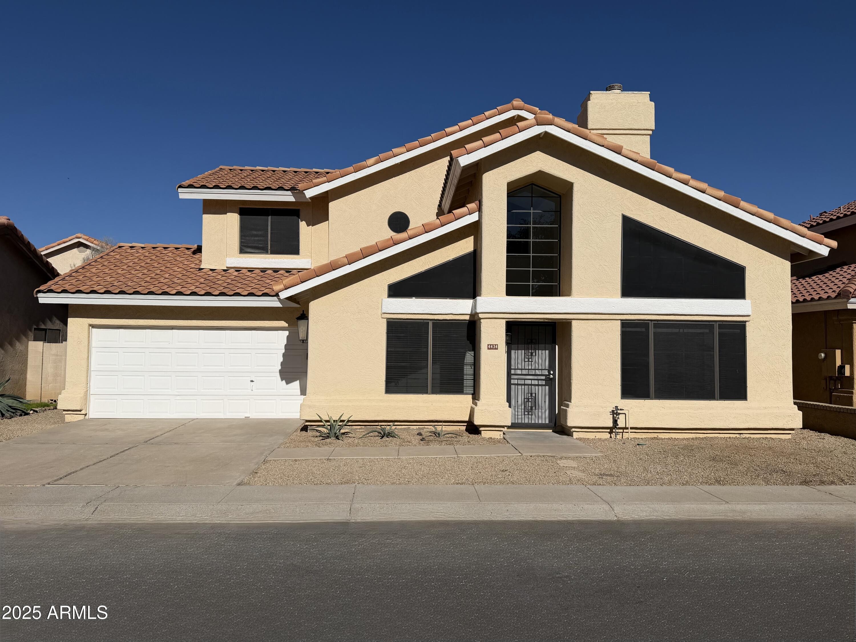 4434 East Annette Drive Phoenix, AZ 85032 - Photo 1 of 27 a front view of a house with a yard