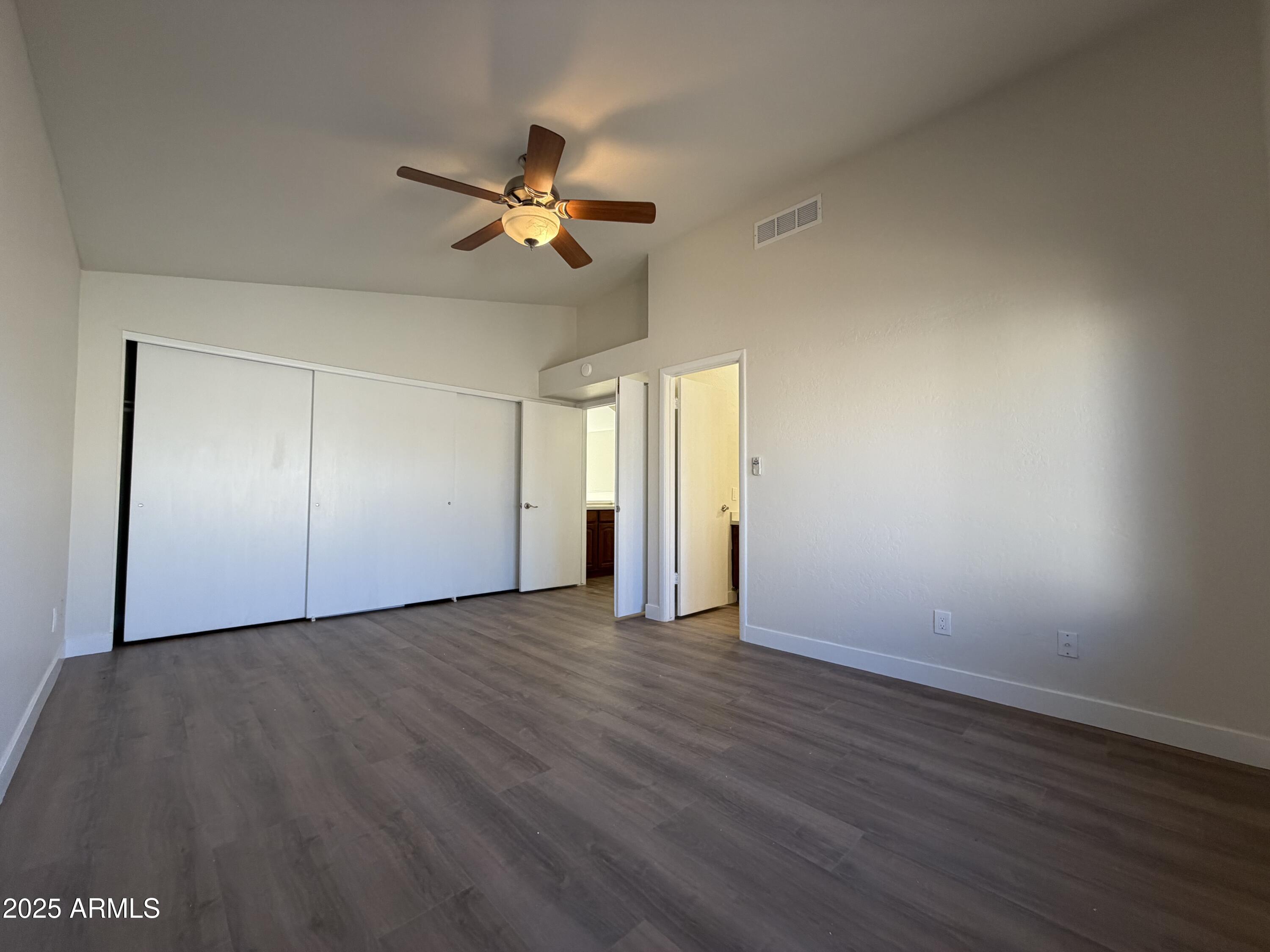 4434 East Annette Drive Phoenix, AZ 85032 - Photo 16 of 27 a view of an empty room with a window