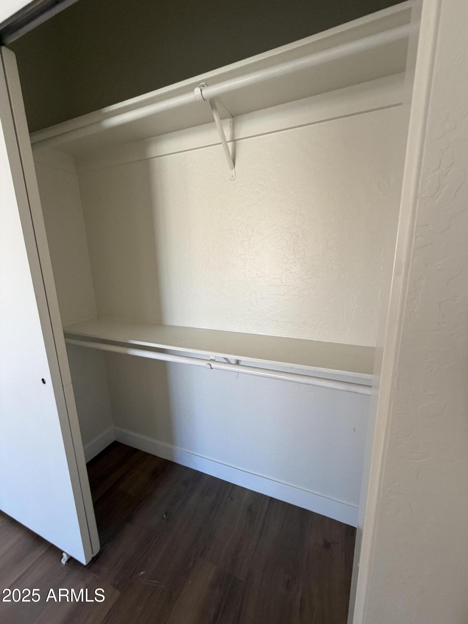 4434 East Annette Drive Phoenix, AZ 85032 - Photo 17 of 27 a view of an empty walk in closet