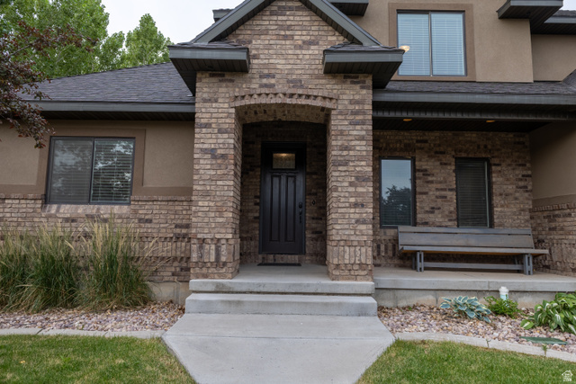 3565 West 1350th Street North Vernal, UT 84078 - Photo 6 of 54 Brick facade home featuring a prominent arched entryway