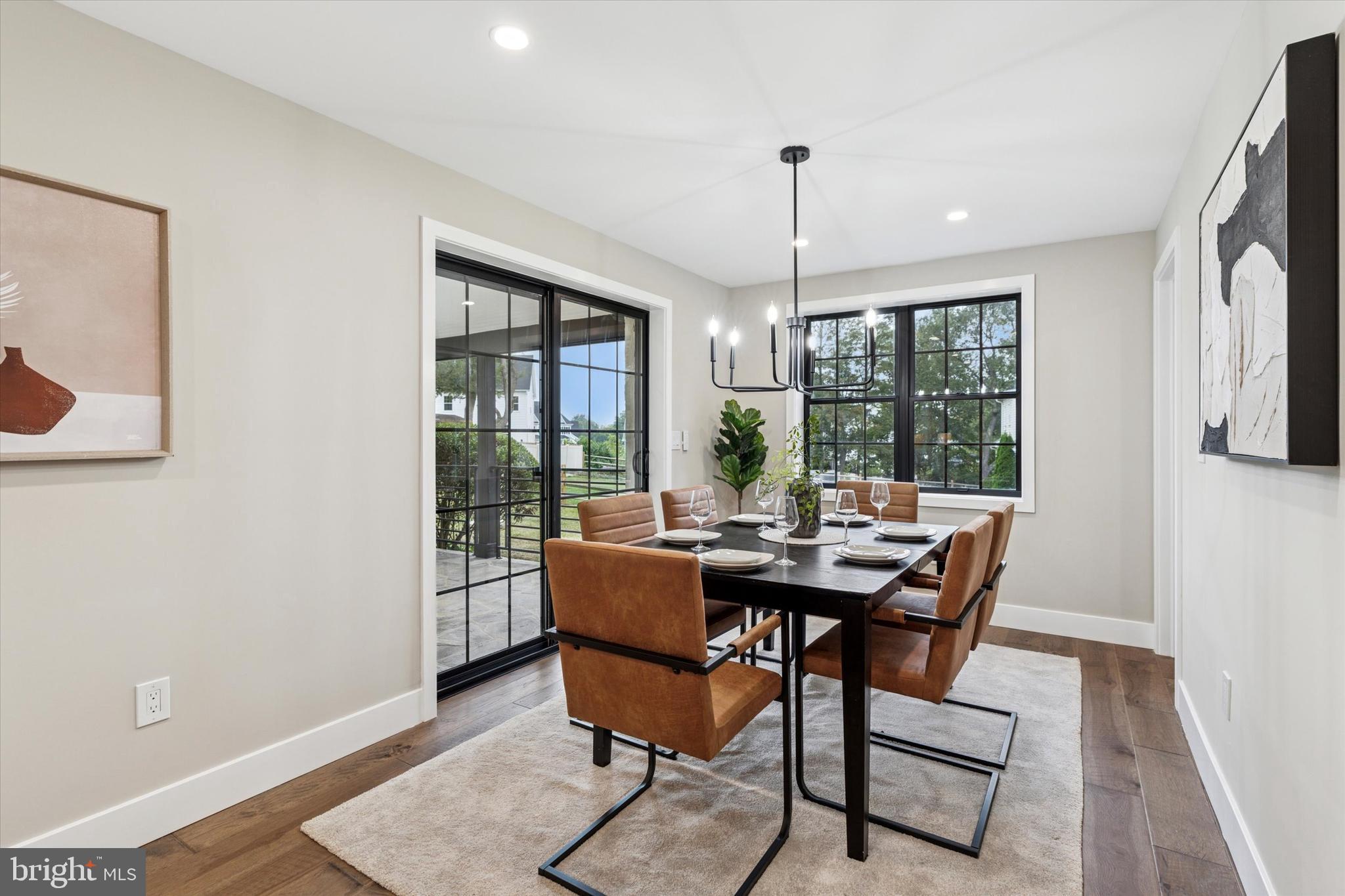 306 Greenhill Road West Chester, PA 19380 - Photo 13 of 42 a view of a dining room with furniture window and wooden floor
