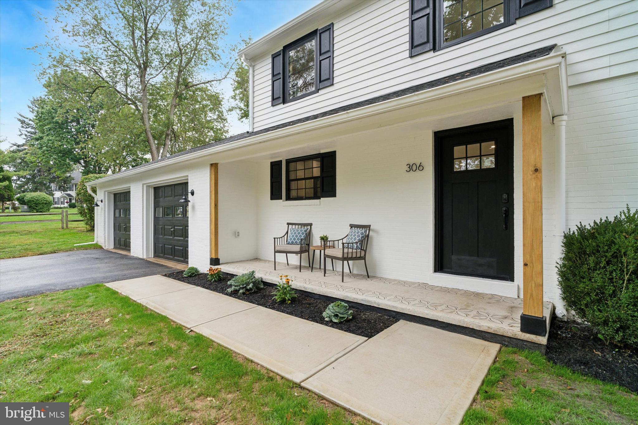 306 Greenhill Road West Chester, PA 19380 - Photo 2 of 42 a front view of house with yard
