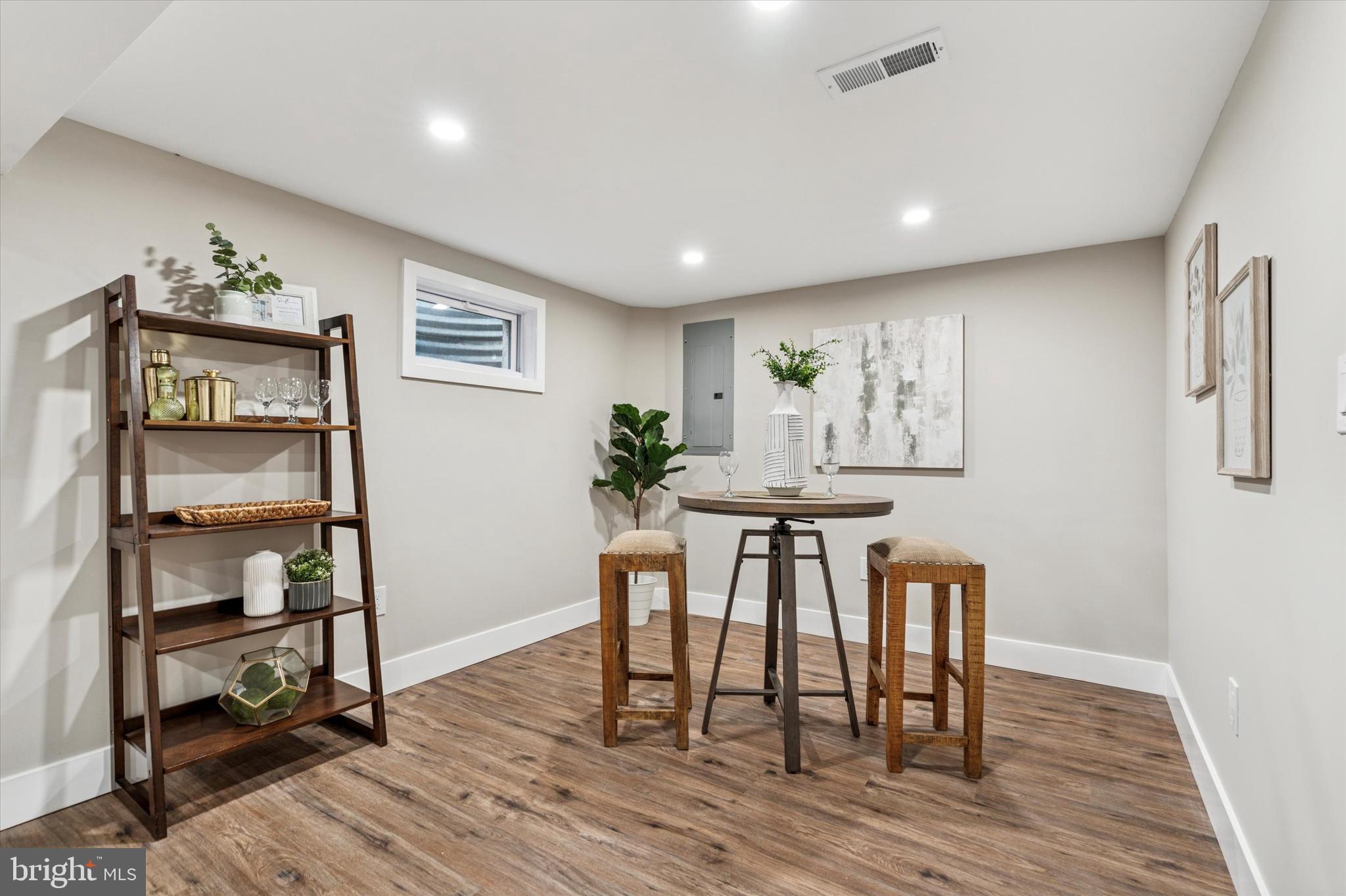 306 Greenhill Road West Chester, PA 19380 - Photo 32 of 42 a view of a dining room with furniture and wooden floor