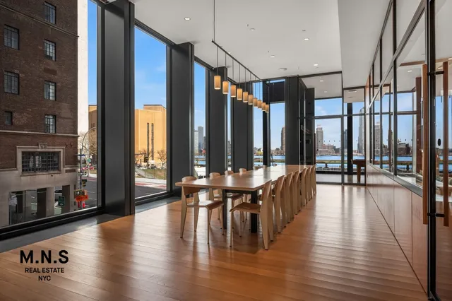 a room with gym equipment and a large window