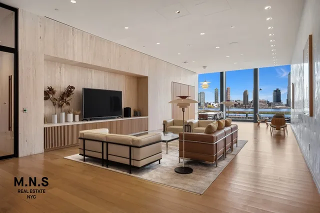 a room with furniture and wooden floor