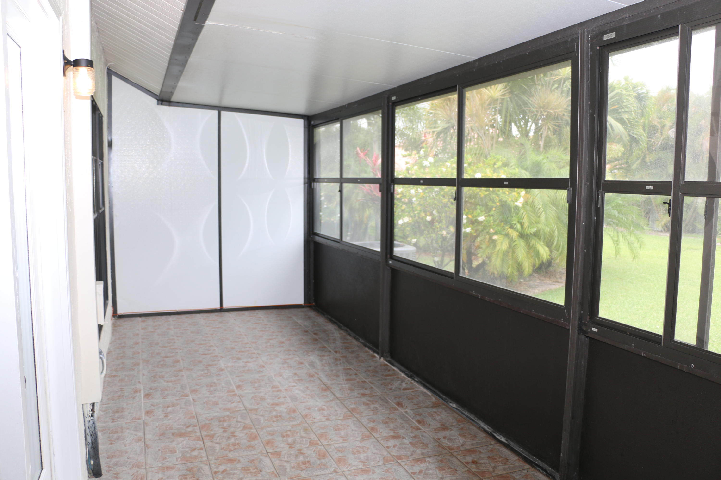 10275 Hidden Springs Court Boca Raton, FL 33498 - Photo 18 of 21 Covered/Screened-in patio