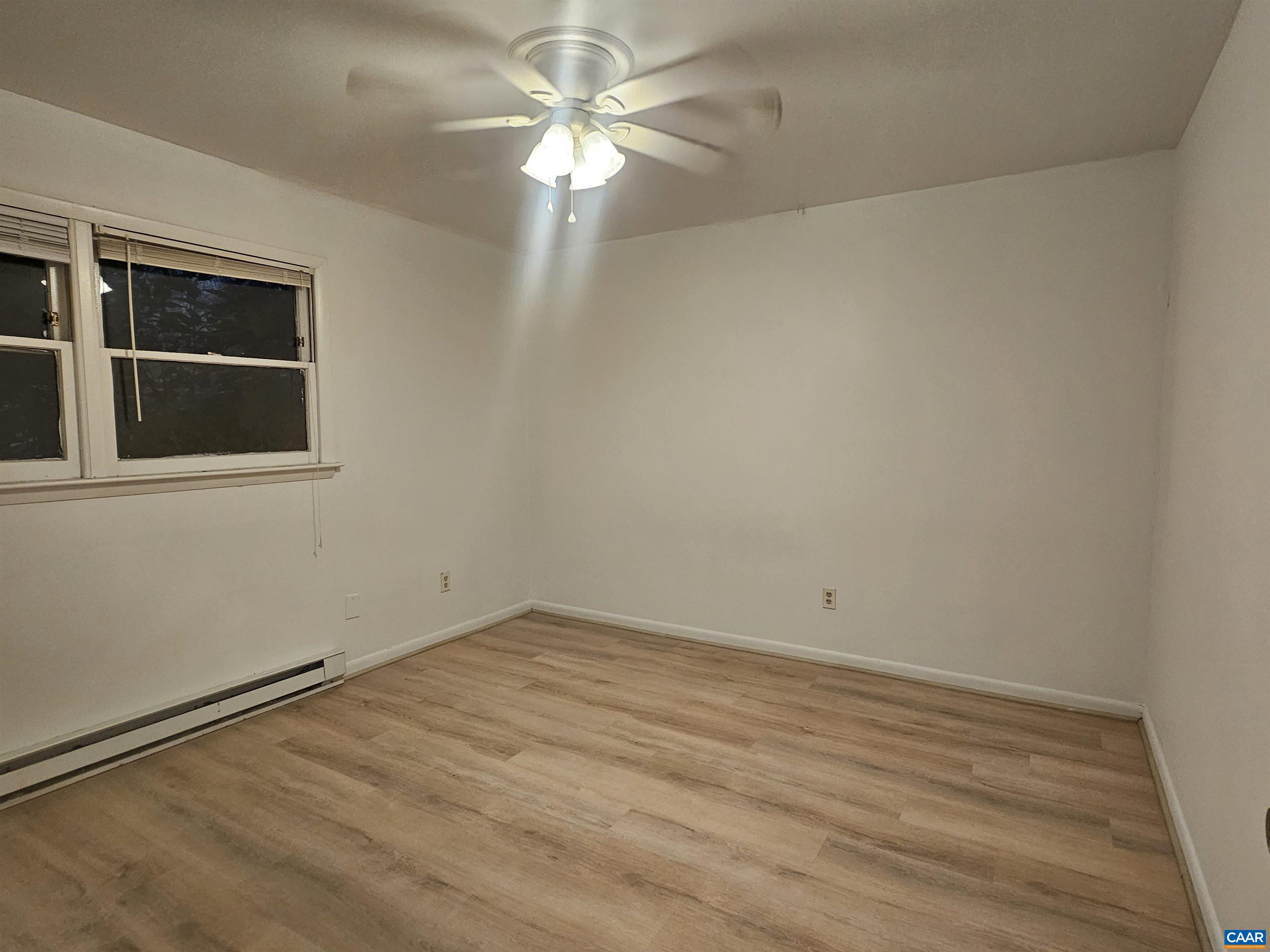 301 Paton Street, Unit A & B Charlottesville, VA 22903 - Photo 24 of 40 wooden floor in an empty room with a window