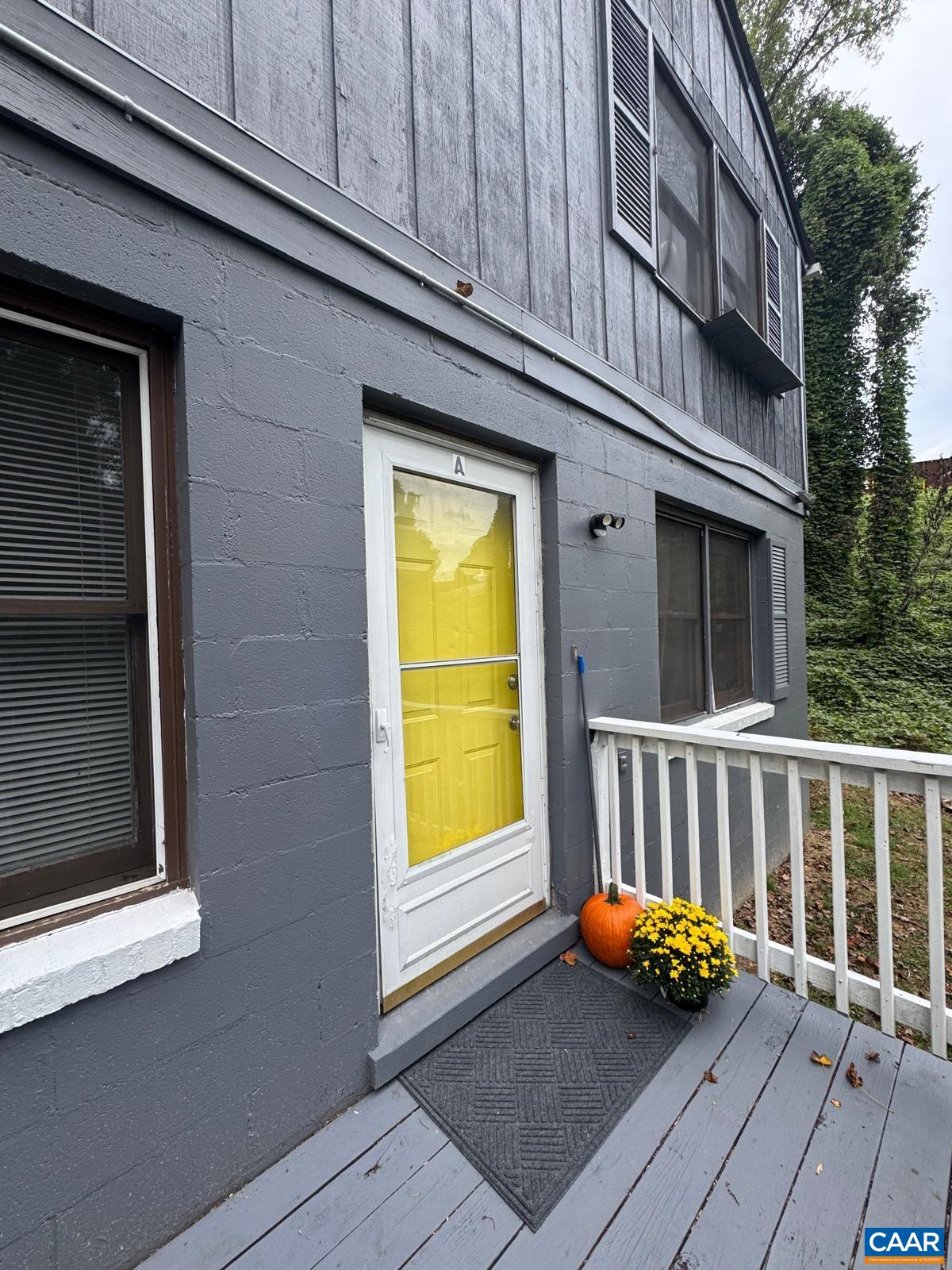 301 Paton Street, Unit A & B Charlottesville, VA 22903 - Photo 8 of 40 a blue bench sitting in front of a building