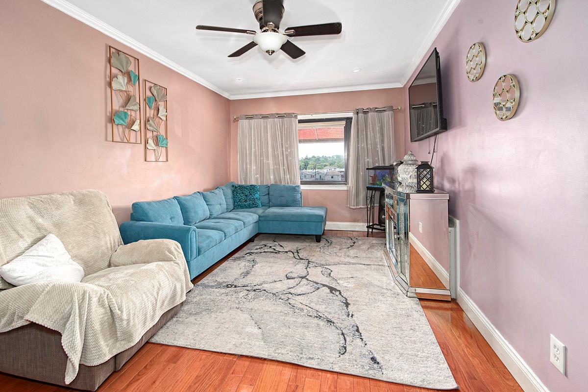 4016 Wilder Avenue Bronx, NY 10466 - Photo 12 of 17 a living room with furniture and a window