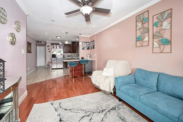 a kitchen with stainless steel appliances granite countertop a stove a sink dishwasher and a refrigerator