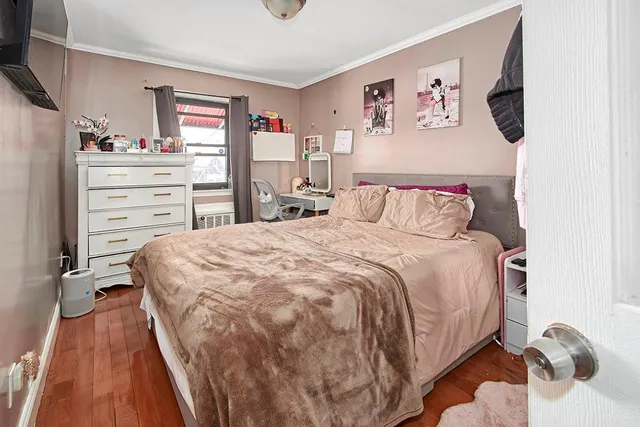 a bedroom with a bed and closet