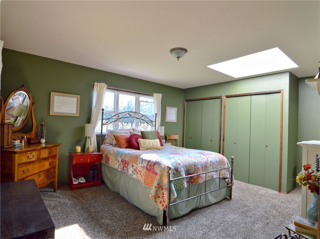 590 West Pole Road Ferndale, WA 98248 - Photo 11 of 40 a bedroom with a bed and window
