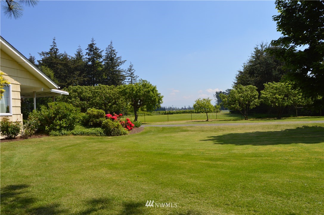 590 West Pole Road Ferndale, WA 98248 - Photo 20 of 40 a view of a house with a big yard