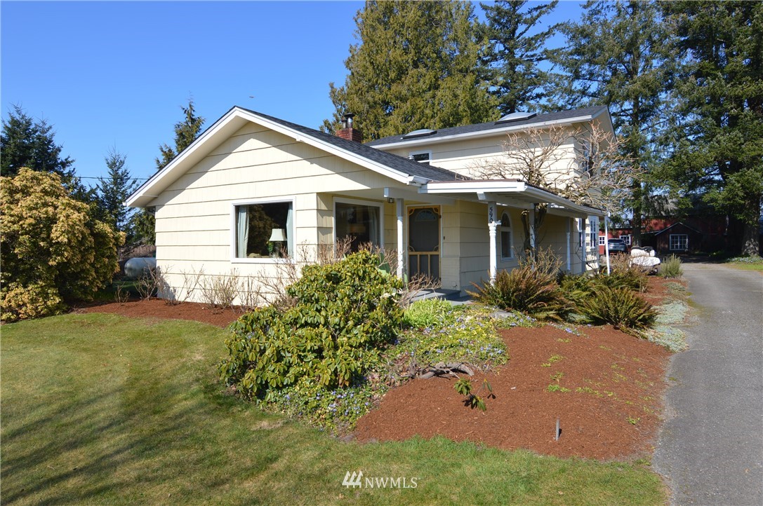 590 West Pole Road Ferndale, WA 98248 - Photo 30 of 40 a view of a house with a yard