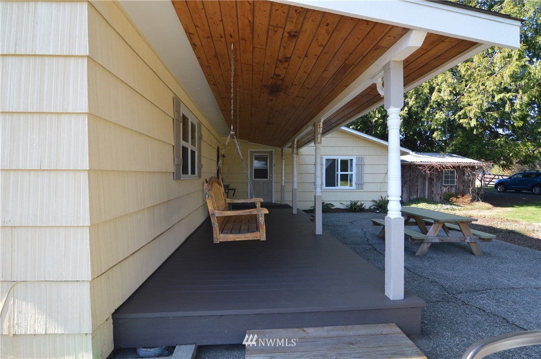 590 West Pole Road Ferndale, WA 98248 - Photo 31 of 40 a backyard of a house with outdoor seating