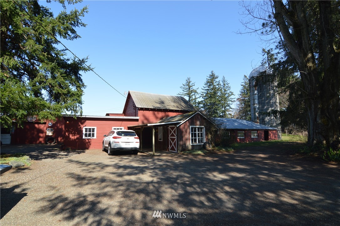 590 West Pole Road Ferndale, WA 98248 - Photo 39 of 40 a front view of a house with a yard