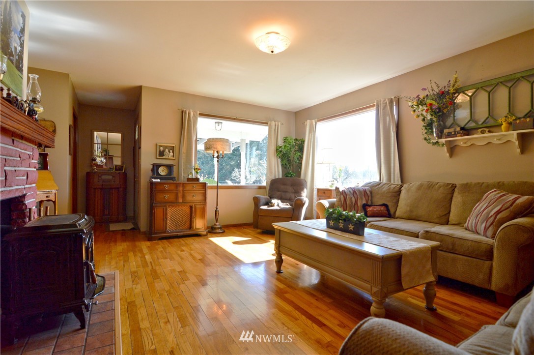 590 West Pole Road Ferndale, WA 98248 - Photo 5 of 40 a living room with furniture and a large window