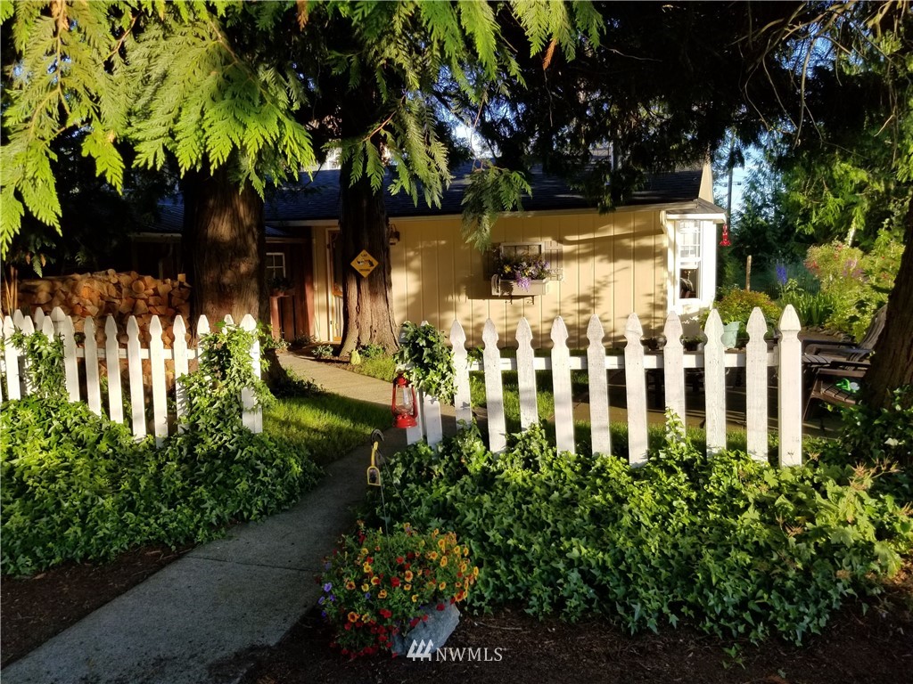 590 West Pole Road Ferndale, WA 98248 - Photo 7 of 40 a view of a house with a yard and potted plants