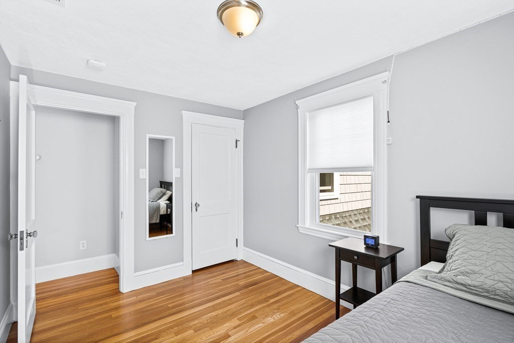 9 Laird Road Medford, MA 02155 - Photo 24 of 41 a bedroom with furniture and a window