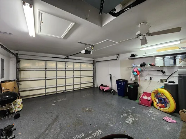 a view of a garage with rack and bicycle