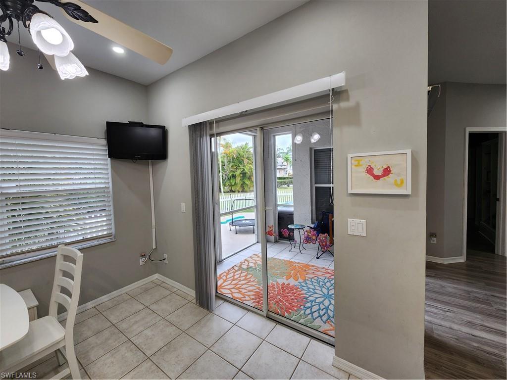 10702 Rio Mar Circle Estero, FL 33928 - Photo 9 of 21 a living room with furniture