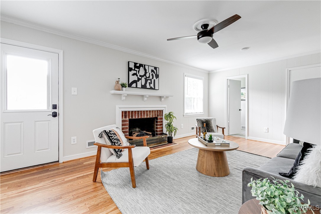 10231 Epsilon Road Richmond, VA 23235 - Photo 13 of 42 a living room with furniture and a fireplace