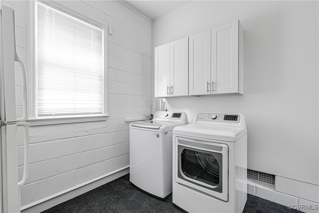 10231 Epsilon Road Richmond, VA 23235 - Photo 21 of 42 a view of washer and dryer in a room