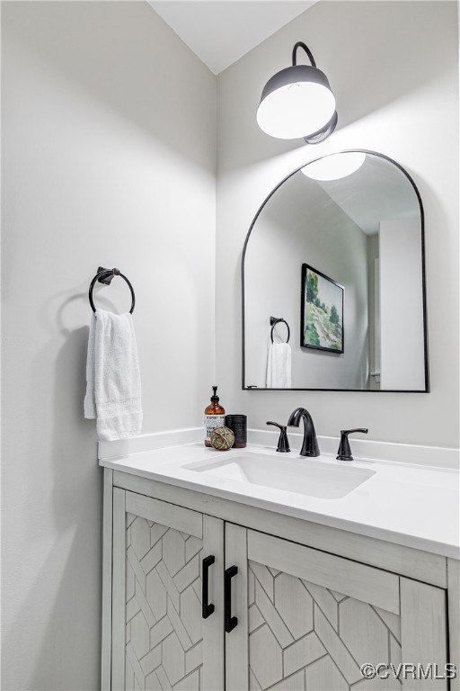 10231 Epsilon Road Richmond, VA 23235 - Photo 22 of 42 a bathroom with a sink and a mirror