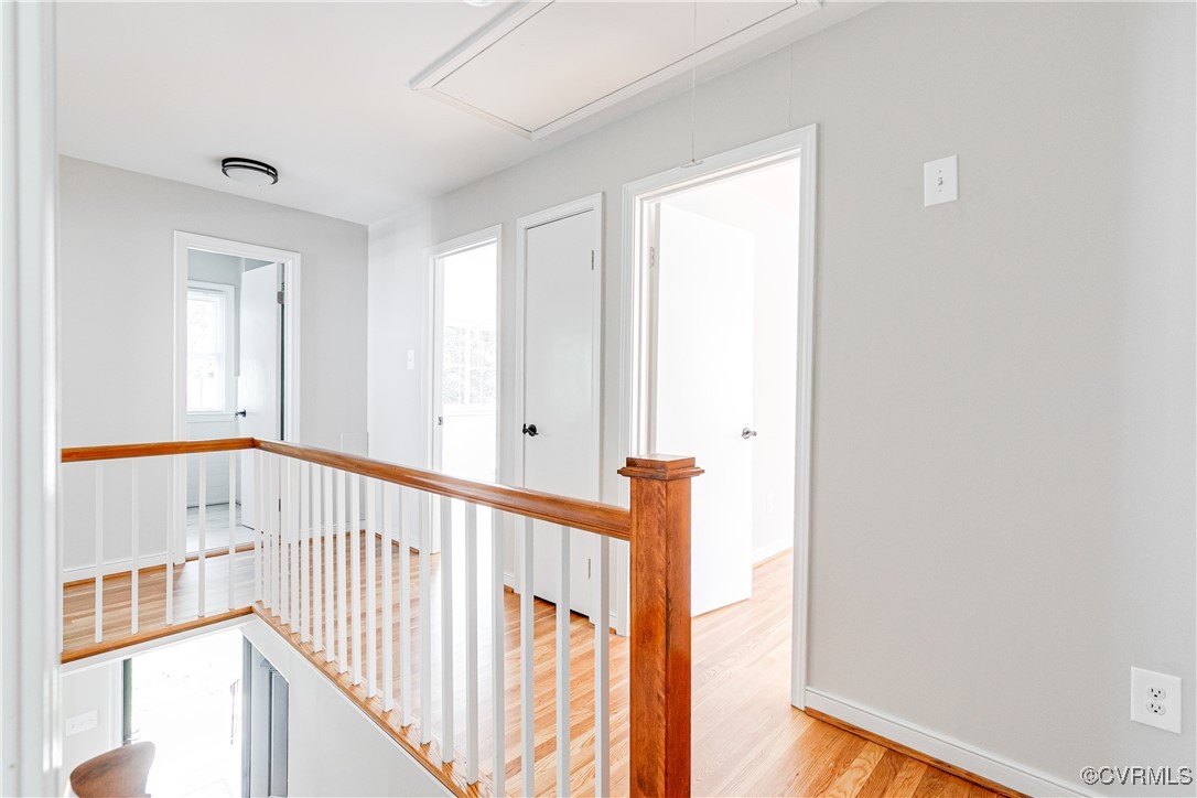 10231 Epsilon Road Richmond, VA 23235 - Photo 23 of 42 a view of a hallway with windows