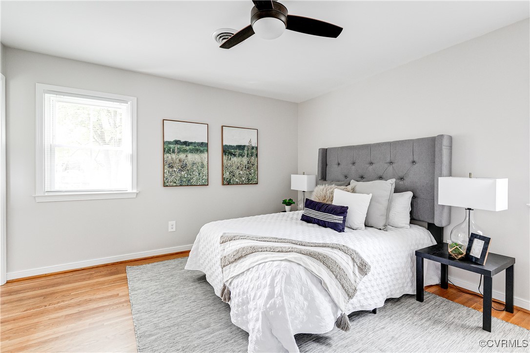10231 Epsilon Road Richmond, VA 23235 - Photo 25 of 42 a bedroom with a bed and a window