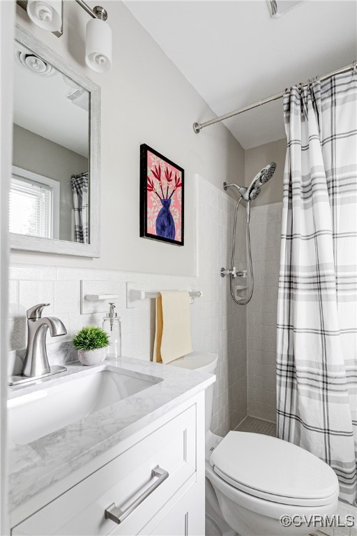 10231 Epsilon Road Richmond, VA 23235 - Photo 27 of 42 a bathroom with a sink a toilet and shower